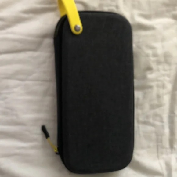 Nintendo Switch Lite with 3 games, 3 characters for Animal Crossing, and case.